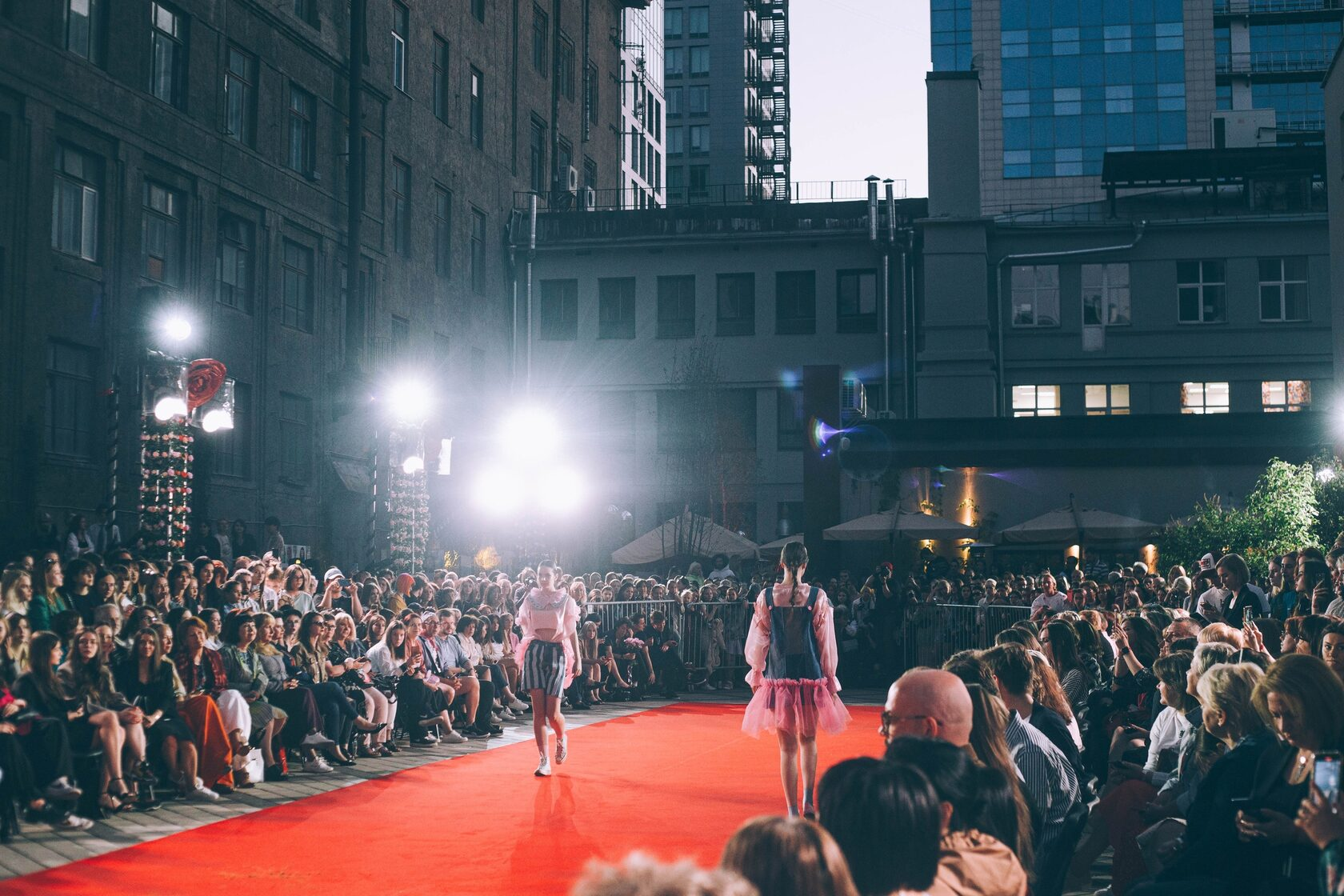 Models on the outdoor runway at the MHPI end-of-year fashion show