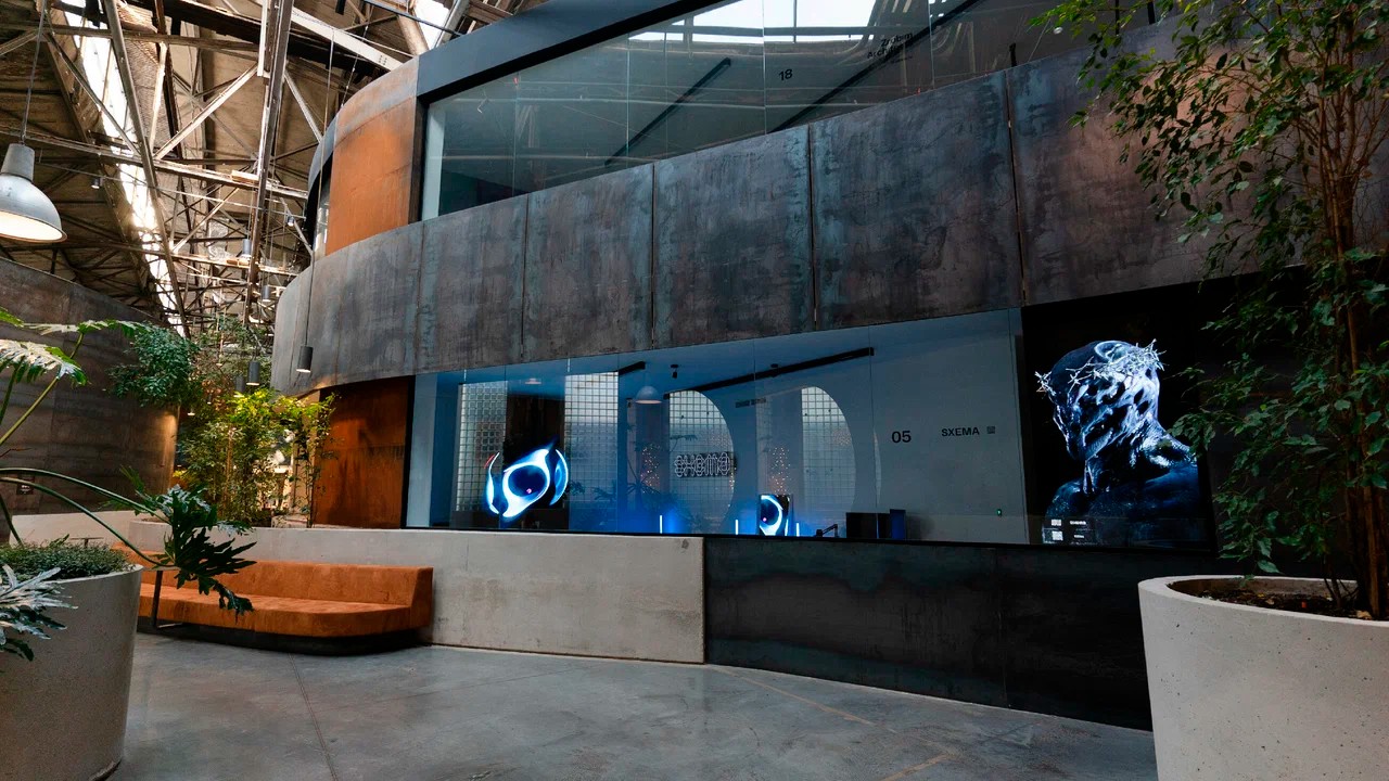 SXEMA showroom and digital art screens at Supermetall